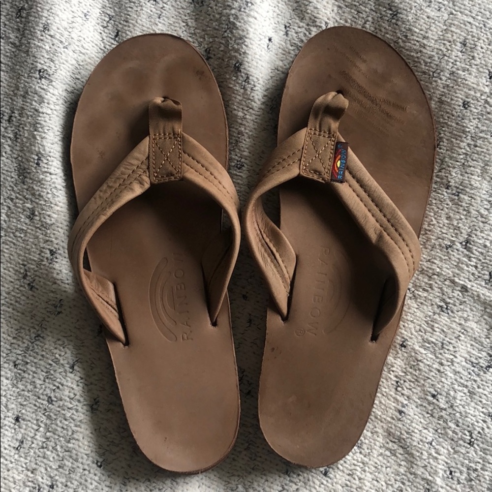 Tan women’s rainbow flip flops
